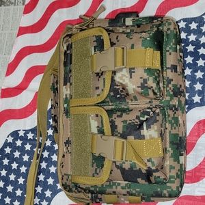 Camouflage canvas crossbody bag. Great for camera and travel.